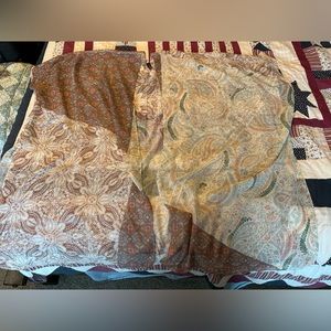 Flowing one size fits all Lane Bryant cover in multi colored neutrals.